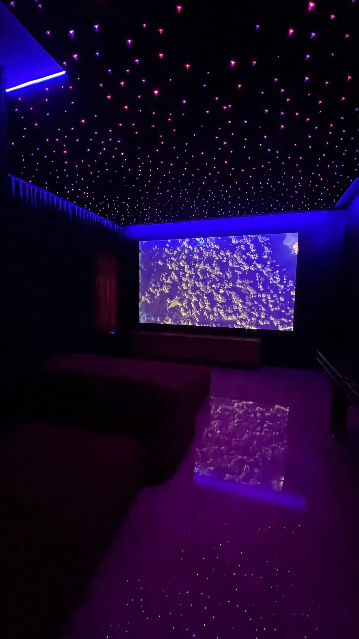 Fibre-optic starlight ceiling in a Melbourne home theatre by Prime Theatres