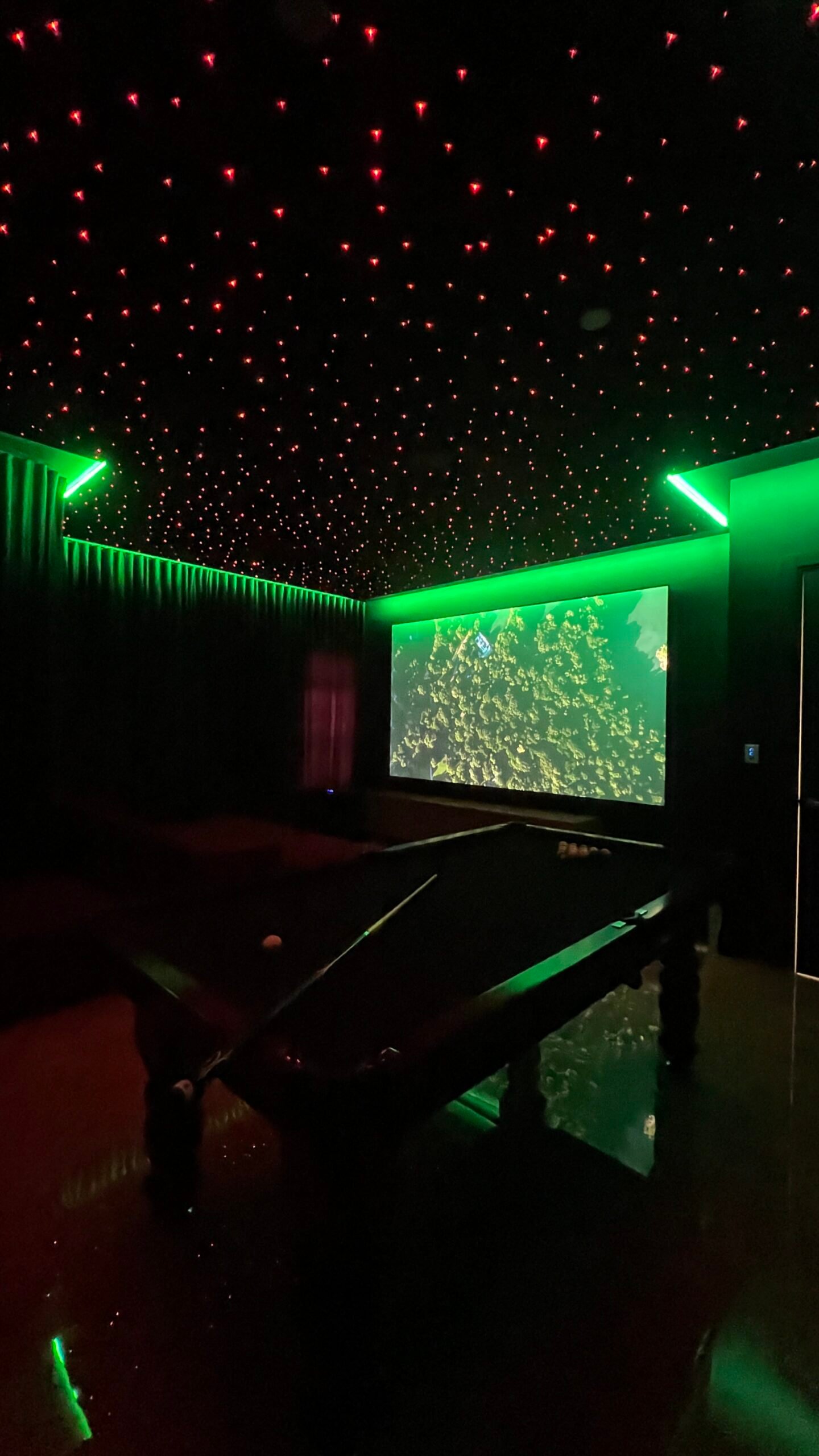 Hand-run custom galaxy ceiling for a home theatre by Prime Theatres